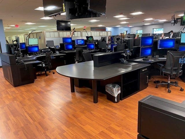 Russ-Bassett-dispatch-concole-with-end-run-meeting-table